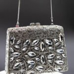 ORNATE OASIS CLUTCH